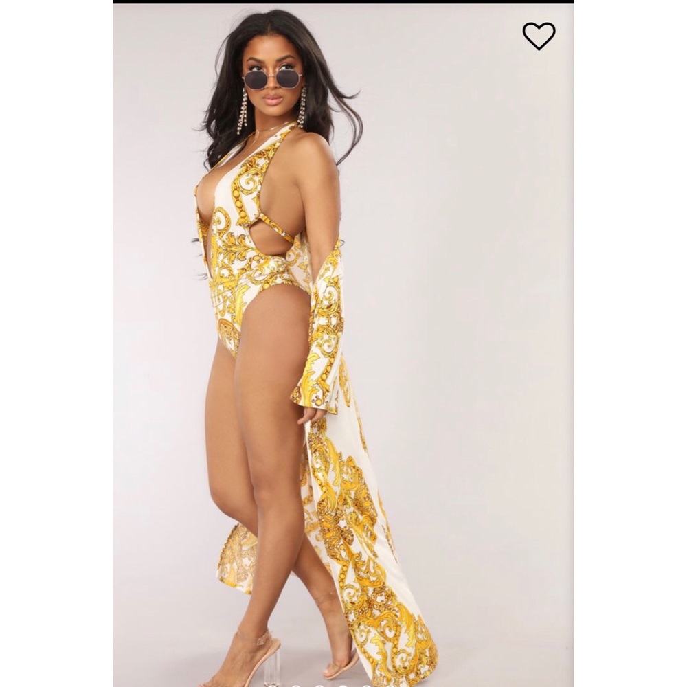 One piece bathing plus bathing cover.